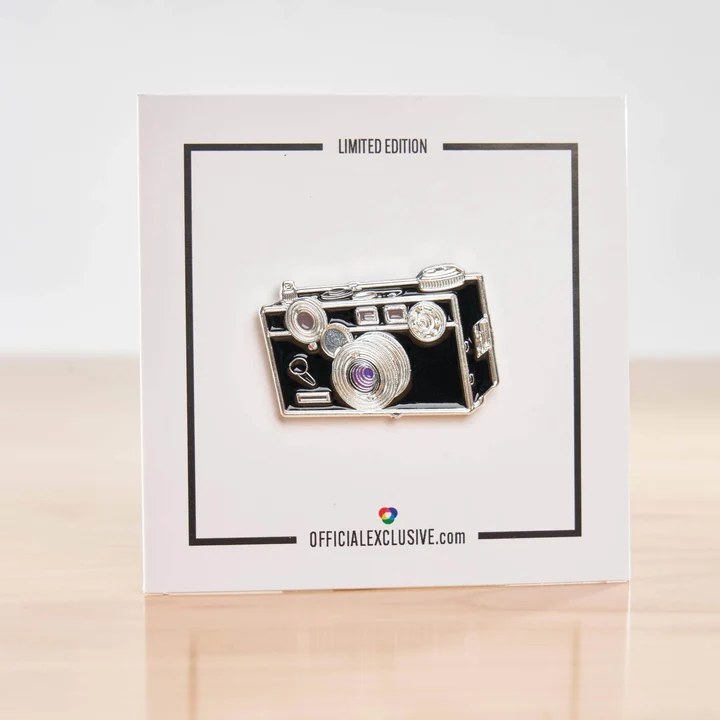 Brick Camera Pin with Purple Lens